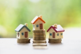 Mini,House,On,Stack,Of,Coins,,Real,Estate,Investment,,Save