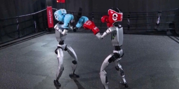 dunyanin-ilk-insansi-robot-boks-maci-cinde-gerceklesti-celik-yumruklar-gokyuzune-yukseldi-X9IYm5HK.jpg